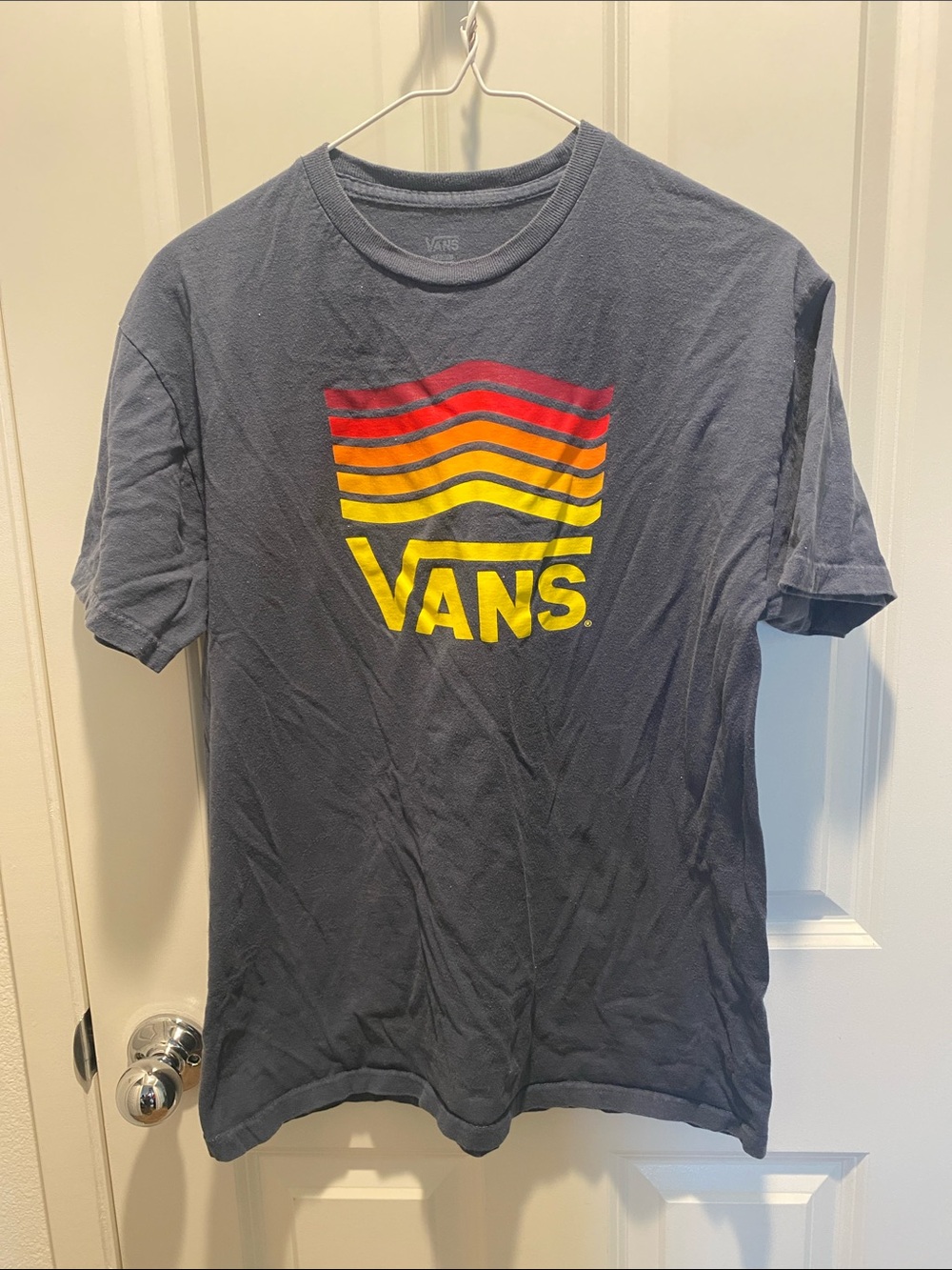 Vans Navy Graphic Tee with Red and Yellow Wave Logo